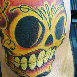 Tattoo of sugar skull with candle