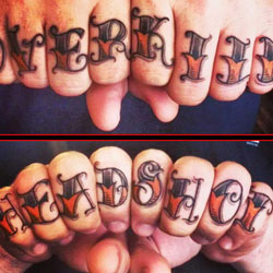 Tattoo of text overkill and headshot