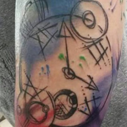 Tattoo of abstract clock